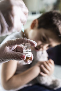 Little boy waiting to be vaccinated from covid-19