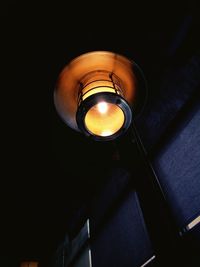 Low angle view of illuminated lamp