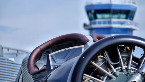 Close-up of motorcycle against sky