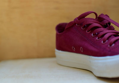 Close-up of shoes on table