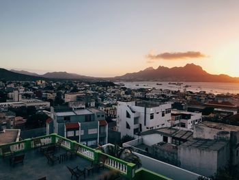 High angle view of townscape against sky during sunset