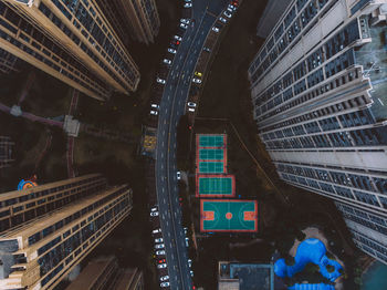 Directly above shot of road amidst buildings in city