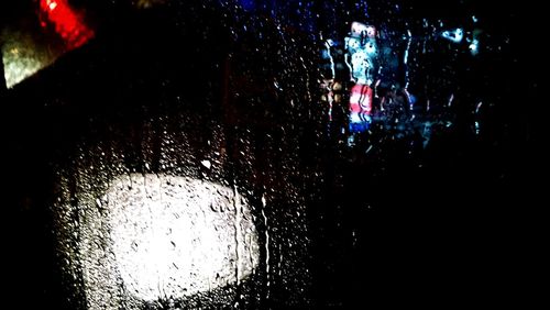 Blurred motion of people in dark room
