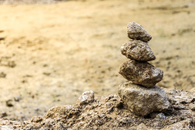 Close-up of stone stack on rock