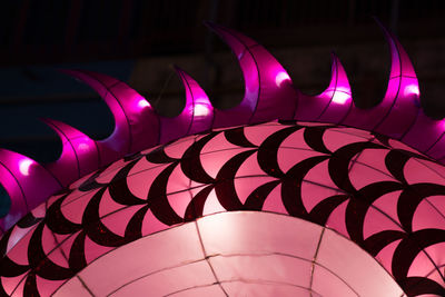 Close-up of illuminated chinese dragon at night