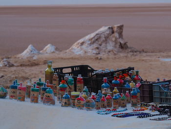 Close-up of cake on table at beach