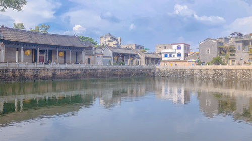 Reflection of buildings in lake