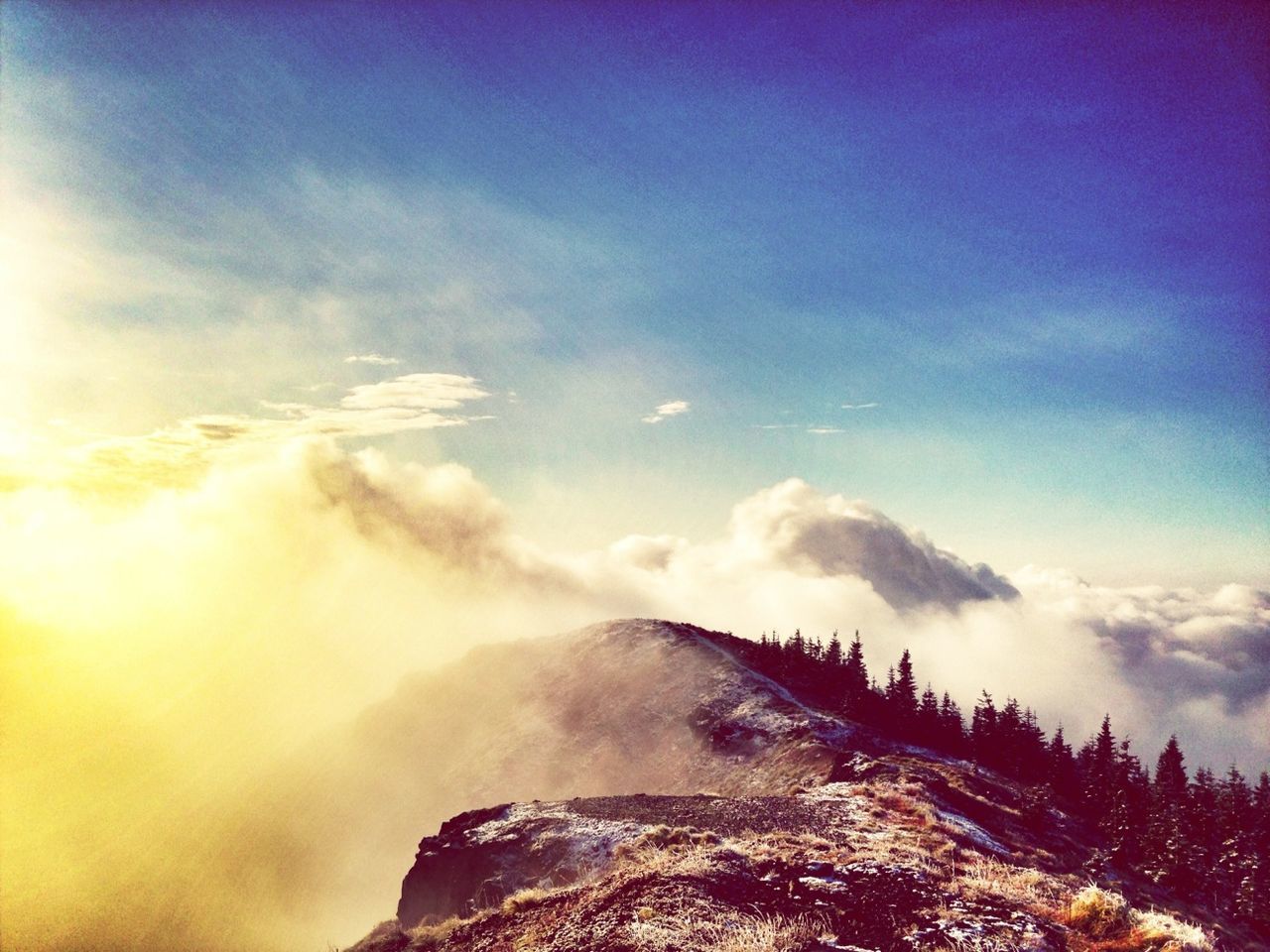 scenics, beauty in nature, sky, tranquil scene, nature, tranquility, rock - object, mountain, idyllic, cloud - sky, geology, non-urban scene, physical geography, motion, rock formation, outdoors, landscape, power in nature, remote, sunlight