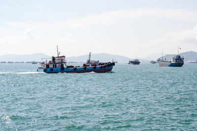 Nautical vessel on sea against sky