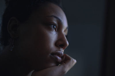 Close-up of pensive young woman