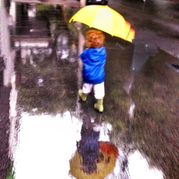 lifestyles, leisure activity, casual clothing, childhood, full length, boys, walking, standing, street, elementary age, reflection, season, girls, person, wet, umbrella, day, rear view