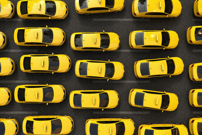 Full frame shot of yellow taxis on road