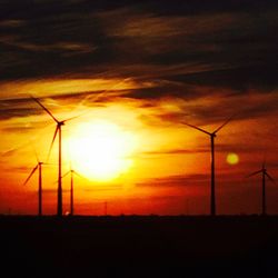 Wind turbines on field