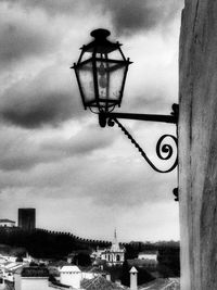 Low angle view of street light against sky