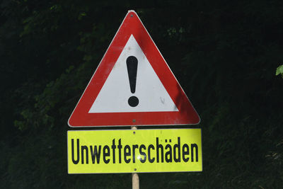 A storm damage warning sign, road sign on the street