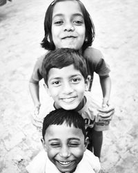 High angle portrait of friends standing on street