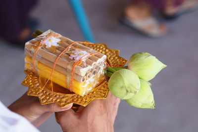 Midsection of person holding ice cream