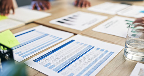 Close-up of documents on table