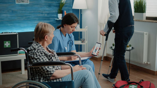 Doctor consulting patient on video call