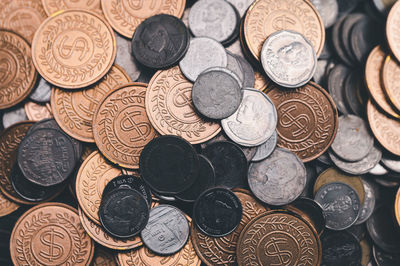 Close-up of coins on table