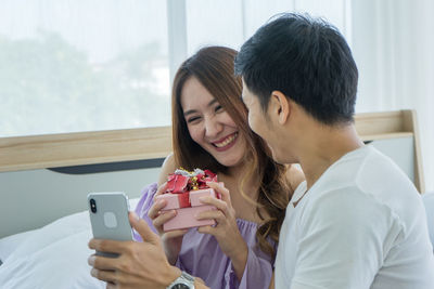 Young man using mobile phone