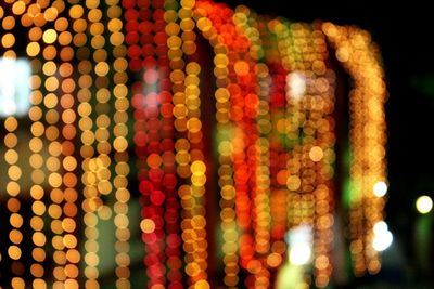 Defocused image of illuminated christmas lights