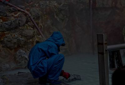 Close-up of woman standing in pond