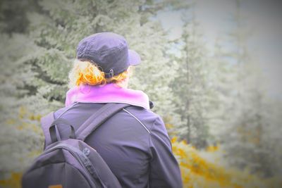 Rear view of man with umbrella