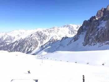 Scenic view of snowcapped mountains