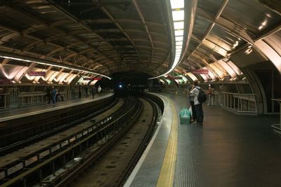 High angle view of people at railroad station