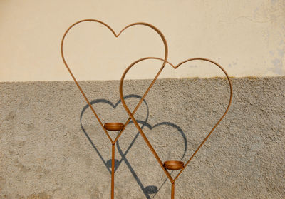 Wrought iron hearts illuminated by the sun