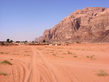 Scenic view of desert against clear sky