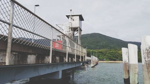 Bridge over river against sky