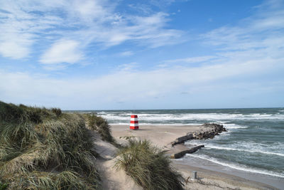 Scenic view of beach against sky