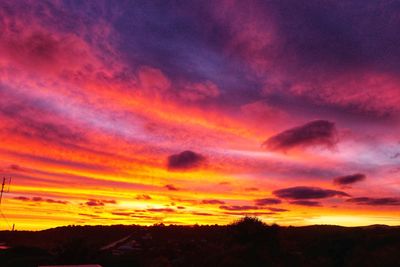 Low angle view of dramatic sky during sunset