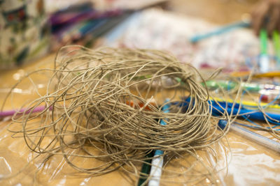 Close-up of string on table