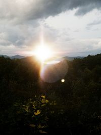 Scenic view of landscape against sky during sunset