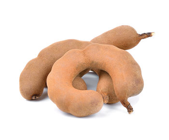 Close-up of cookies against white background