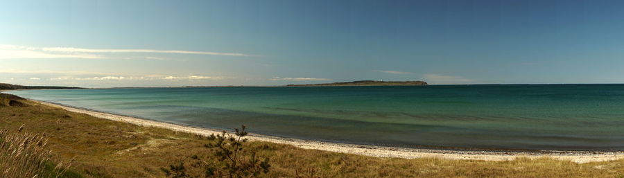 Scenic view of beach against sky