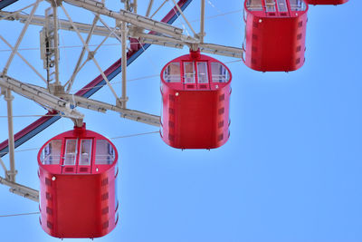 Red gondola on the ferris wheel