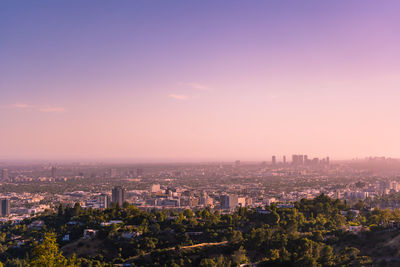 High angle view of buildings against sky at sunset