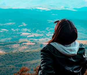 Rear view of woman looking at sea