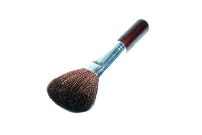 Close up of make-up brush on white background