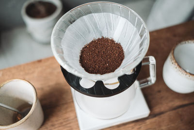 High angle view of coffee cup on table