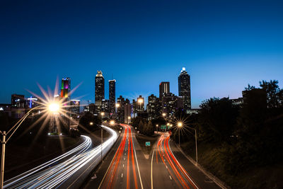 High angle view of light trails on the road heading into downtown atlanta. jackson street bridge 