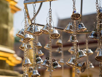 Close-up of chandelier hanging at store