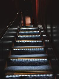 Empty illuminated steps in building