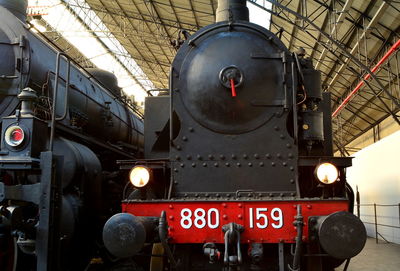 Low angle view of illuminated train in museum