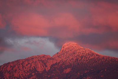 Low angle view of mountain against sky during sunset