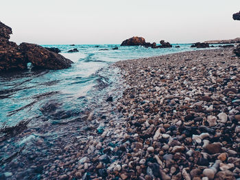 Scenic view of sea against clear sky